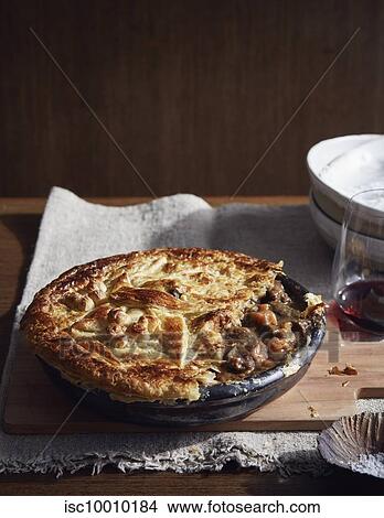 Kangaroo Burgundy pie, a bush tucker dish using indigenous ingredients View Large Photo Image Picture - Kangaroo Burgundy pie, a bush tucker dish using indigenous ingredients. Fotosearch