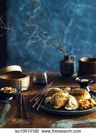Stock Image - Kimchi mandu (korean dumplings). Fotosearch