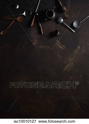 Stock Photo - Kitchen utensils, teapot, spoons. Fotosearch