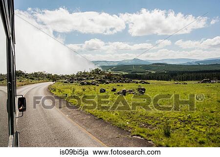 Landscape view from rural highway with low cloud over valley, South Africa View Large Photo Image Stock Image - Landscape view from rural highway with low cloud over valley, South Africa. Fotosearch