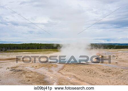 Landscape with steaming geyser, Yellowstone National Park, Wyoming, USA View Large Photo Image Stock Photography - Landscape with steaming geyser, Yellowstone National Park, Wyoming, USA. Fotosearch