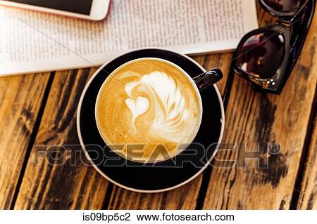 Latte art in cup of coffee View Large Photo Image Stock Image - Latte art in cup of coffee. Fotosearch