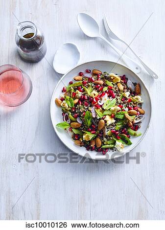 Lentil and tricolour quinoa salad with cinnamon dressing View Large Photo Image Stock Photograph - Lentil and tricolour quinoa salad with cinnamon dressing. Fotosearch