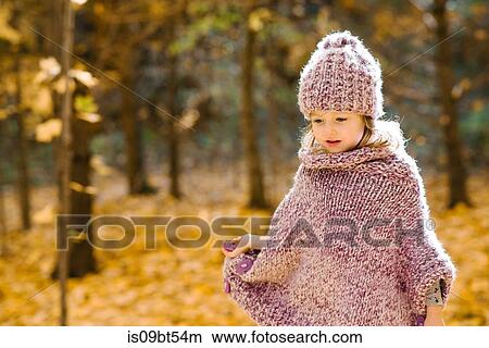 Little girl in forest View Large Photo Image Picture - Little girl in forest. Fotosearch