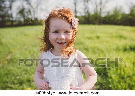Picture - Little girl in park. Fotosearch