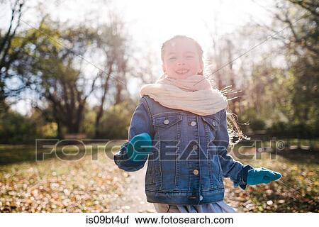 Little girl running in forest View Large Photo Image Stock Image - Little girl running in forest. Fotosearch