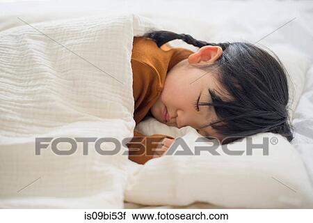 Little girl sleeping in bed View Large Photo Image Stock Image - Little girl sleeping in bed. Fotosearch