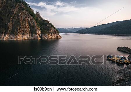 Stock Image - Local car ferry moored on lakeside, Draja, Vaslui, Romania. Fotosearch