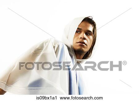 Male model wearing raincoat View Large Photo Image Stock Image - Male model wearing raincoat. Fotosearch