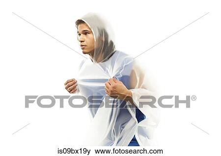 Male model wearing raincoat View Large Photo Image Stock Photo - Male model wearing raincoat. Fotosearch