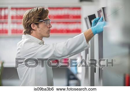 Male worker in thread factory, using touch screen View Large Photo Image Stock Photograph - Male worker in thread factory, using touch screen. Fotosearch