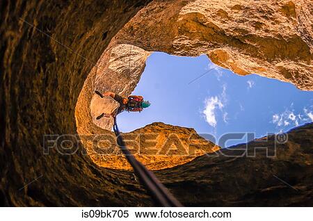 Man abseiling, low angle view, Smith Rock State Park, Terrebonne, Oregon, United States View Large Photo Image Stock Photography - Man abseiling, low angle view, Smith Rock State Park, Terrebonne, Oregon, United States. Fotosearch