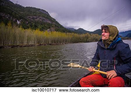 Man canoeing in Squamish River to Howe Sound, Canada View Large Photo Image Stock Photo - Man canoeing in Squamish River to Howe Sound, Canada. Fotosearch