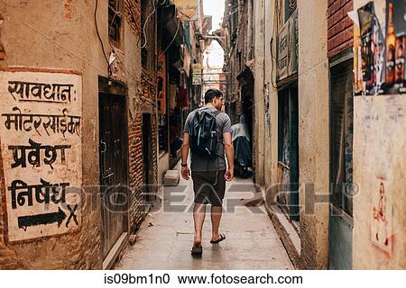 Man exploring alleyway, Kathmandu, Nepal View Large Photo Image Stock Image - Man exploring alleyway, Kathmandu, Nepal. Fotosearch