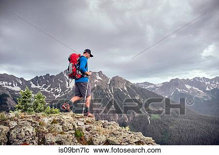 Stock Image - Man hiking, Mount Sneffels, Ouray, Colorado, USA. Fotosearch