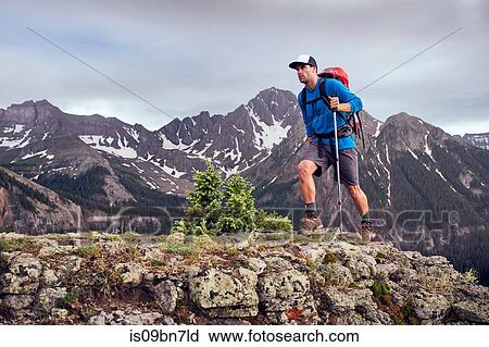 Stock Image - Man hiking, Mount Sneffels, Ouray, Colorado, USA. Fotosearch