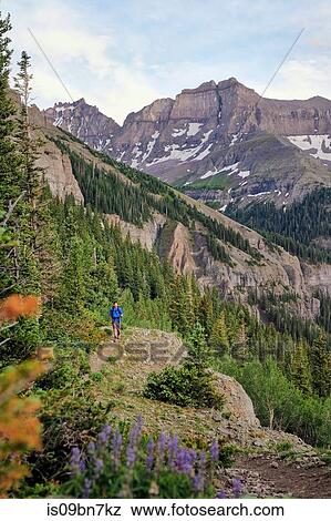 Man hiking, Mount Sneffels, Ouray, Colorado, USA View Large Photo Image Stock Photo - Man hiking, Mount Sneffels, Ouray, Colorado, USA. Fotosearch