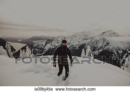 Man in deep snow on mountain, Abbotsford, Canada View Large Photo Image Stock Image - Man in deep snow on mountain, Abbotsford, Canada. Fotosearch
