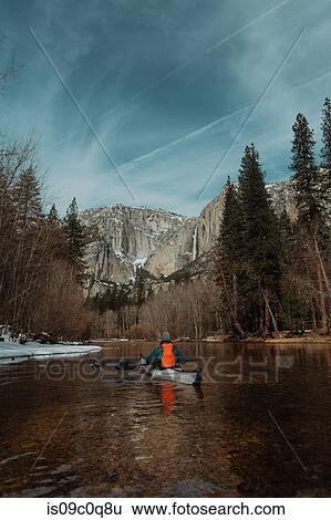 Man kayaking in lake, Yosemite Village, California, United States View Large Photo Image Stock Photograph - Man kayaking in lake, Yosemite Village, California, United States. Fotosearch
