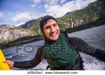 Man kite surfing in sea, Squamish, Canada View Large Photo Image Stock Image - Man kite surfing in sea, Squamish, Canada. Fotosearch