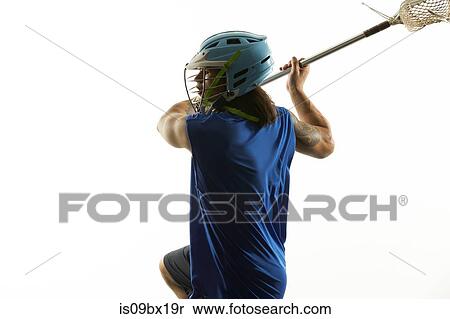 Man modelling lacrosse helmet and stick View Large Photo Image Stock Photography - Man modelling lacrosse helmet and stick. Fotosearch