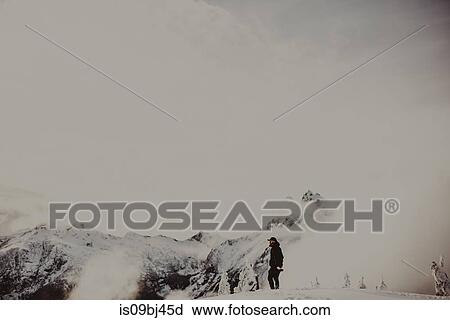 Man on snow covered mountain, Abbotsford, Canada View Large Photo Image Stock Image - Man on snow covered mountain, Abbotsford, Canada. Fotosearch