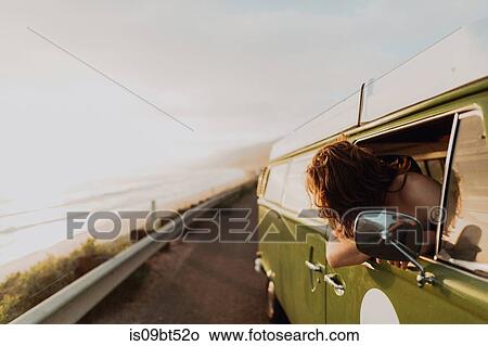 Man on van road trip on coastal road, Ventura, California, US View Large Photo Image Picture - Man on van road trip on coastal road, Ventura, California, US. Fotosearch