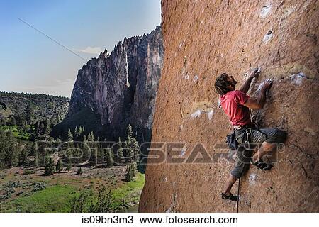 Man rock climbing, Smith Rock State Park, Oregon, USA View Large Photo Image Stock Image - Man rock climbing, Smith Rock State Park, Oregon, USA. Fotosearch