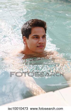 Man swimming to edge of pool View Large Photo Image Stock Image - Man swimming to edge of pool. Fotosearch