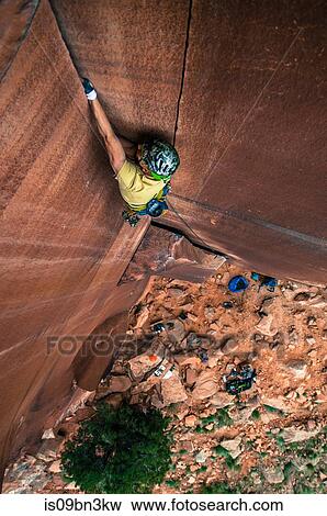 Man trad climbing, Indian Creek, Moab, Utah, USA View Large Photo Image Stock Photo - Man trad climbing, Indian Creek, Moab, Utah, USA. Fotosearch