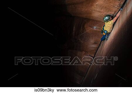 Man trad climbing, Indian Creek, Moab, Utah, USA View Large Photo Image Stock Photo - Man trad climbing, Indian Creek, Moab, Utah, USA. Fotosearch