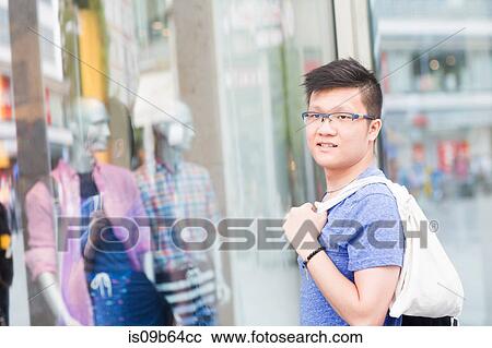 Man window shopping View Large Photo Image Stock Image - Man window shopping. Fotosearch