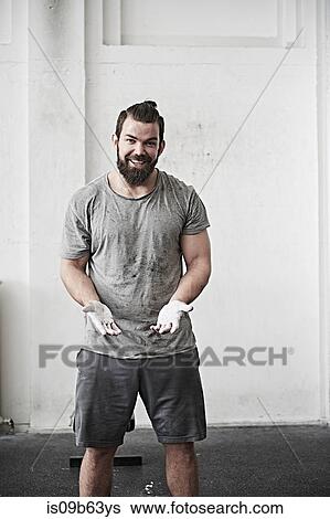 Man with chalked hands View Large Photo Image Stock Photograph - Man with chalked hands. Fotosearch