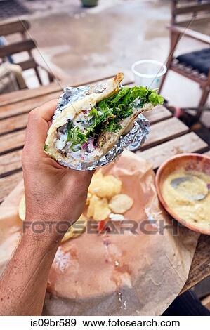 Meal of salad wrap, potato chips and dip View Large Photo Image Stock Photo - Meal of salad wrap, potato chips and dip. Fotosearch