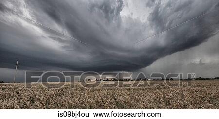 Mesocylone spins over rural Collyer, Kansas, US View Large Photo Image Stock Photograph - Mesocylone spins over rural Collyer, Kansas, US. Fotosearch