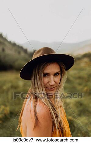 Mid adult woman in felt hat in rural valley, portrait, Mineral King, California, USA View Large Photo Image Stock Photo - Mid adult woman in felt hat in rural valley, portrait, Mineral King, California, USA. Fotosearch