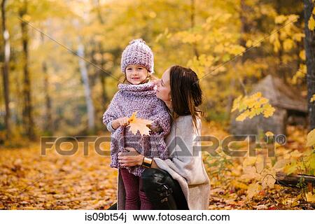 Mother and daughter in forest View Large Photo Image Stock Image - Mother and daughter in forest. Fotosearch