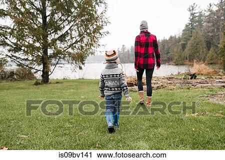 Mother and son on walk by lake, Kingston, Ontario, Canada View Large Photo Image Stock Image - Mother and son on walk by lake, Kingston, Ontario, Canada. Fotosearch