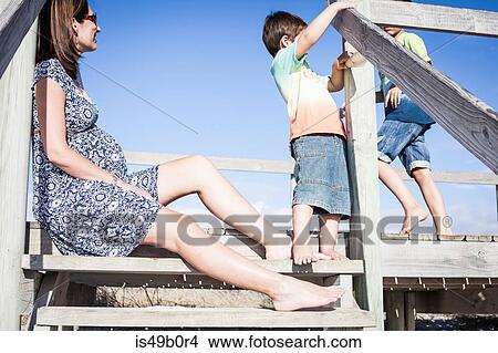Mother and sons on beach, Cape Town, South Africa View Large Photo Image Picture - Mother and sons on beach, Cape Town, South Africa. Fotosearch