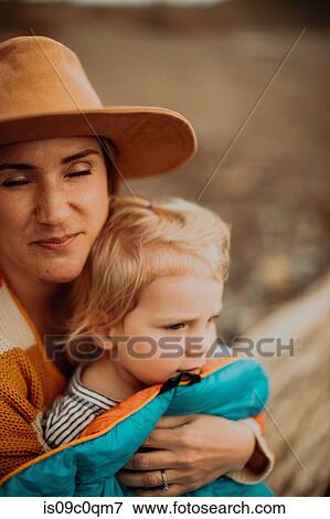 Stock Photo - Mother and toddler enjoying outdoors. Fotosearch