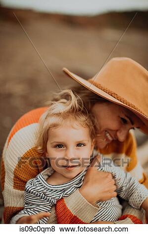 Stock Photo - Mother and toddler enjoying outdoors. Fotosearch