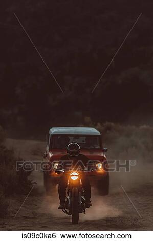 Motorbiker and off road vehicle going through landscape of Kennedy Meadows, California, US View Large Photo Image Stock Photograph - Motorbiker and off road vehicle going through landscape of Kennedy Meadows, California, US. Fotosearch