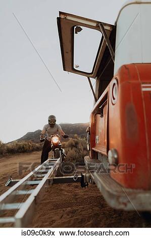 Motorbiker beside off road vehicle, Kennedy Meadows, California, US View Large Photo Image Stock Photo - Motorbiker beside off road vehicle, Kennedy Meadows, California, US. Fotosearch