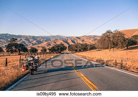 Motorcycle on open road, Yosemite National Park, United States View Large Photo Image Stock Photography - Motorcycle on open road, Yosemite National Park, United States. Fotosearch