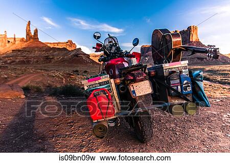 Stock Photo - Motorcycle on rock climbing route, Canyonlands National Park, Moab, Utah, USA. Fotosearch