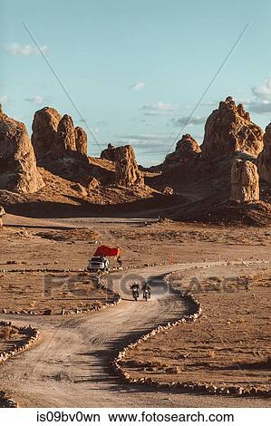 Motorcyclist friends riding in desert, Trona Pinnacles, California, US View Large Photo Image Picture - Motorcyclist friends riding in desert, Trona Pinnacles, California, US. Fotosearch