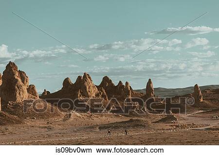 Picture - Motorcyclists riding in desert, Trona Pinnacles, California, US. Fotosearch