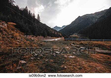 Mountain valley roadside landscape, Draja, Vaslui, Romania View Large Photo Image Stock Image - Mountain valley roadside landscape, Draja, Vaslui, Romania. Fotosearch