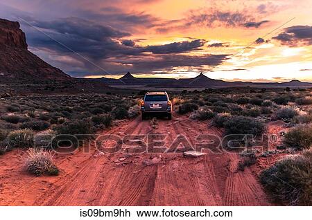 Off road vehicle facing sunset, Indian Creek, Moab, Utah, USA View Large Photo Image Stock Image - Off road vehicle facing sunset, Indian Creek, Moab, Utah, USA. Fotosearch