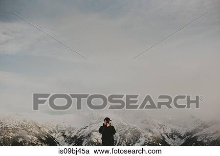 Photographer on snow covered mountain, Abbotsford, Canada View Large Photo Image Stock Image - Photographer on snow covered mountain, Abbotsford, Canada. Fotosearch